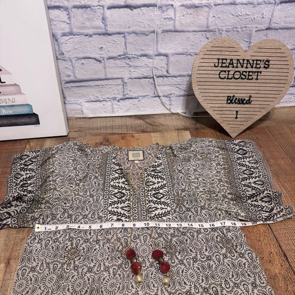 Bell silk boho print with gold chain tassel tie
Bell by Alicia Bell
Silk/cotton - Picture 6 of 9